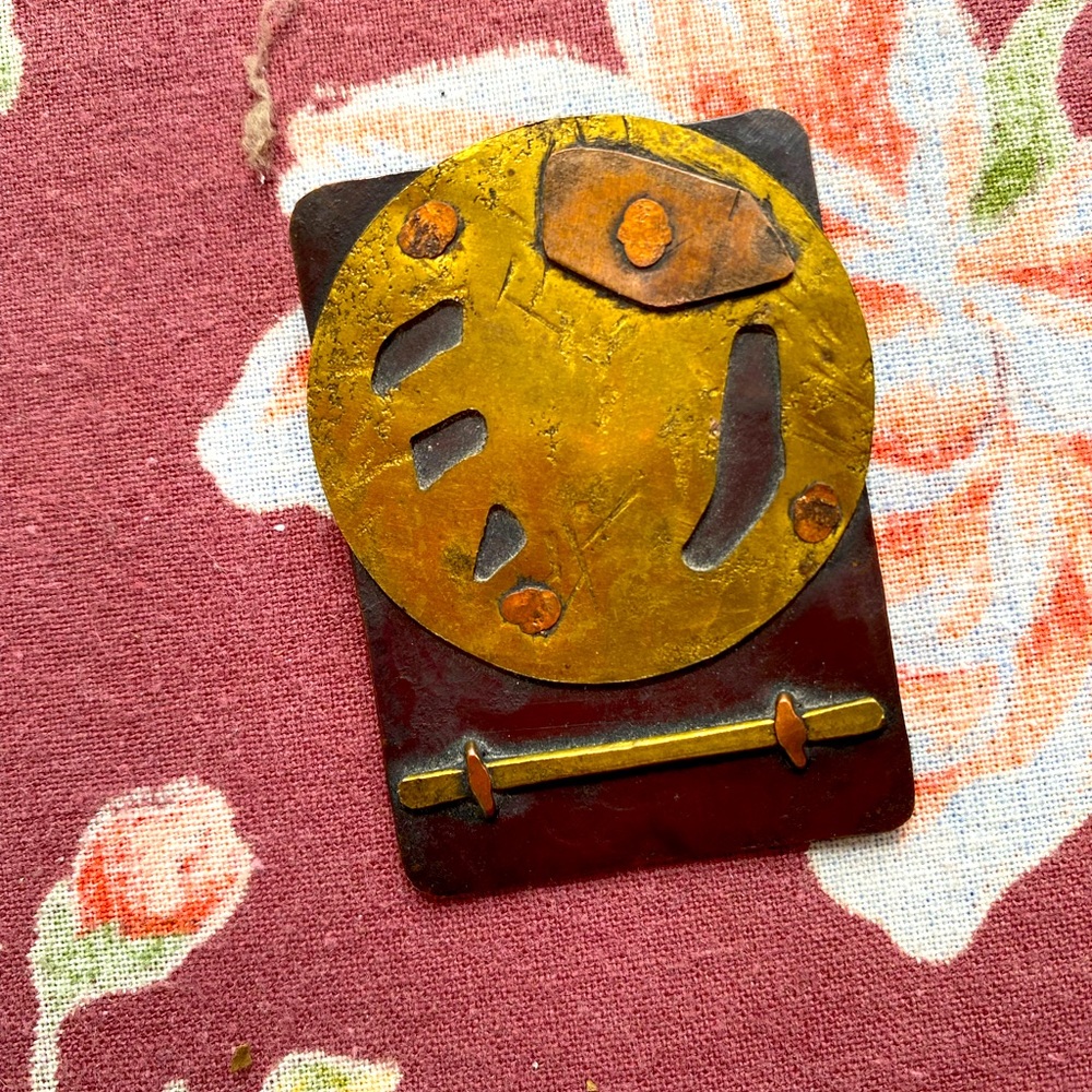 Mixed metals vintage artisan pin. 1 1/2” wide by 2” length